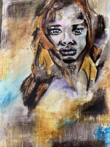 lady in hood looking lonely